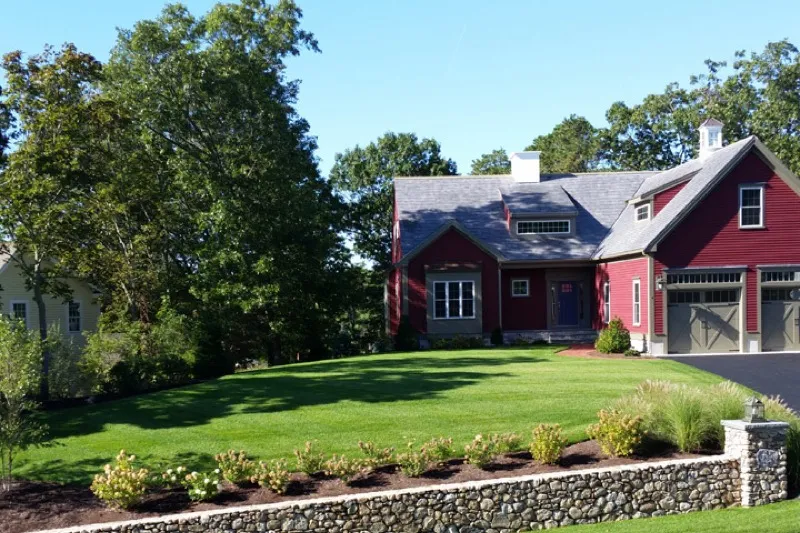 Lawn maintenance crew trimming and edging